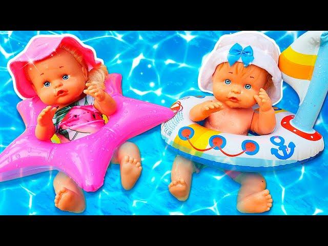 I gemellini Nenuco si nascondono dal sole in sabbiera e in piscina. Video per i bambini piccoli