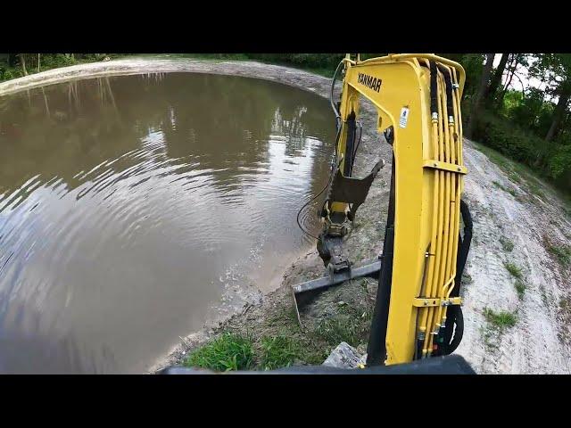 Grading Seeding and  Strawing The Forgotten Pond