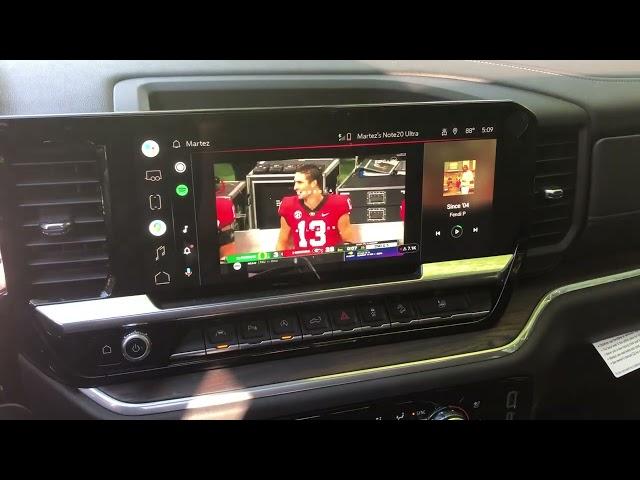 2022 GMC Sierra watching TV on the information screen.