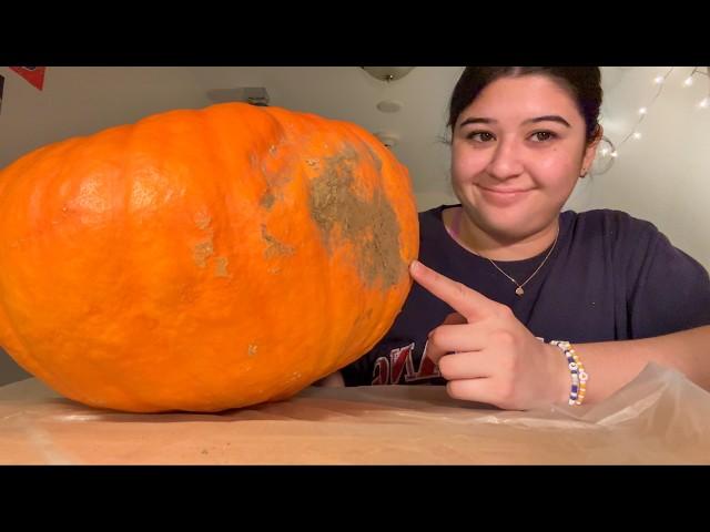 carving my face onto a pumpkin