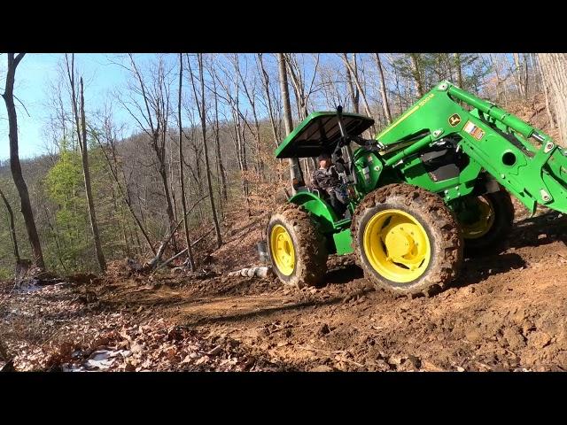 First Taste of Real Work for the new Deere! Skidding logs, spreading gravel.