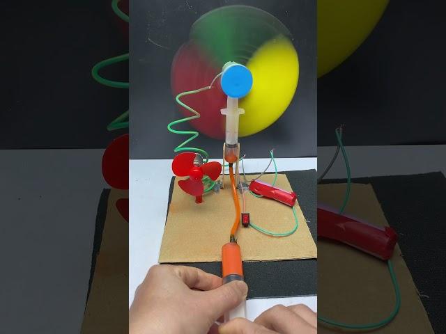 Dc motor fan project with hydraulic #dcmotor #dcmotorproject #tech #scienceproject #shorts #diy