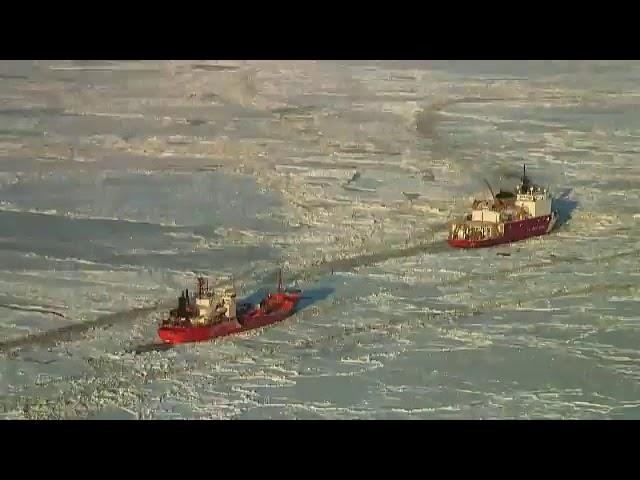 Nation's only operating Polar ice breaker, CGC Healy, breaks ice for Nome bound tanker