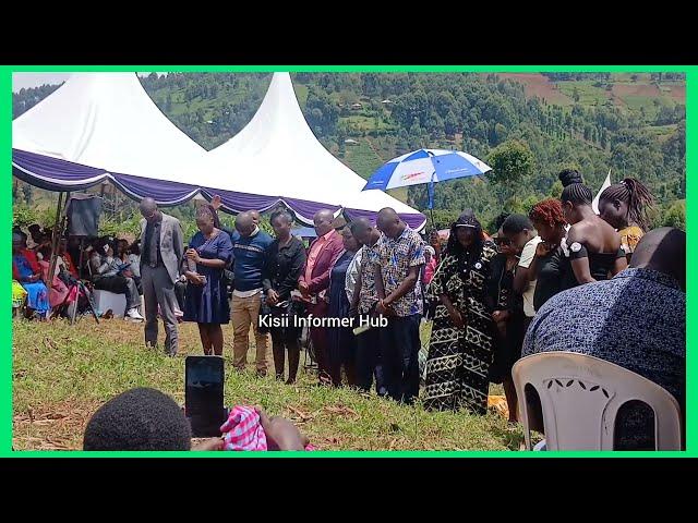 BOAZ OGeto wife june and kid  family introduced at burial boaz |boaz wife at graveside | boaz ogeto