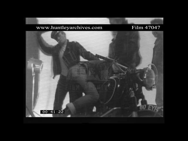 Gay young men in camp biker gear.  Archive film 47047
