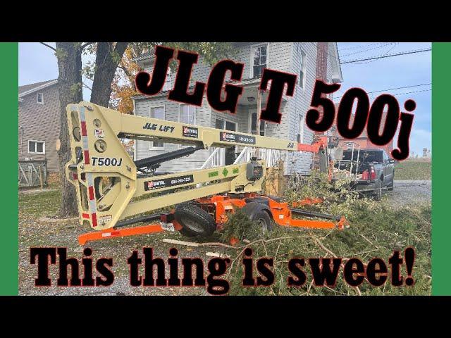 Tree removal project with JLG lift t500j