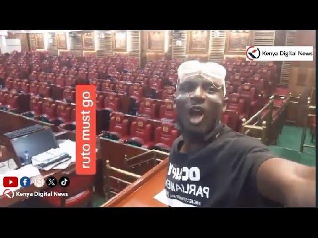 Angry Protester sits On Wetangula's Seat in Parliament as he says! 'RUTO MUST GO!!'