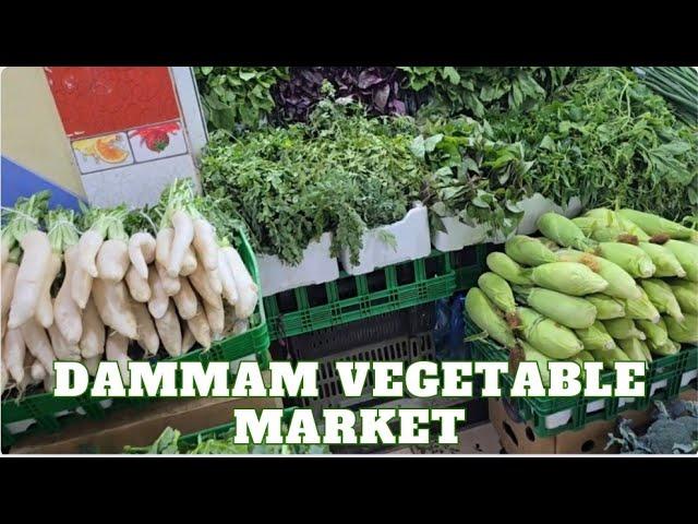 Purchasing VEGETABLES at DAMMAM MARKET Vegetable Section.