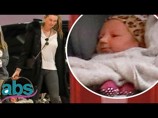 Behati Prinsloo's newborn daughter Gio Grace wears leopard print hat