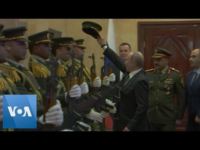 Putin Replaces Dropped Cap of Palestinian Honor Guard