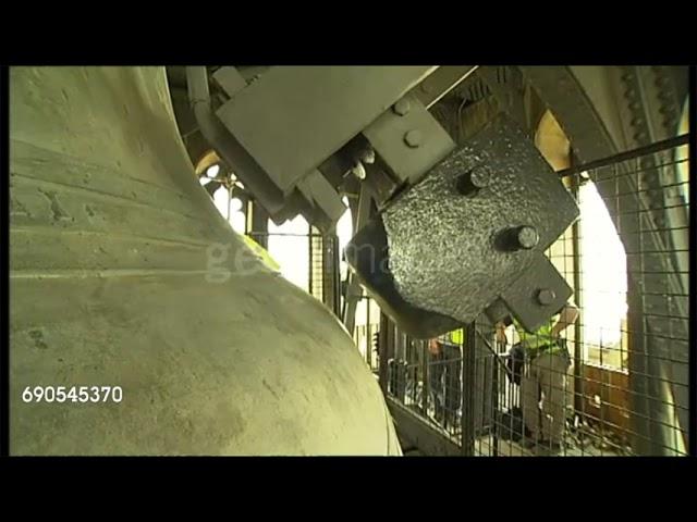 close up shot of hammer chiming big quarter bell and big ben