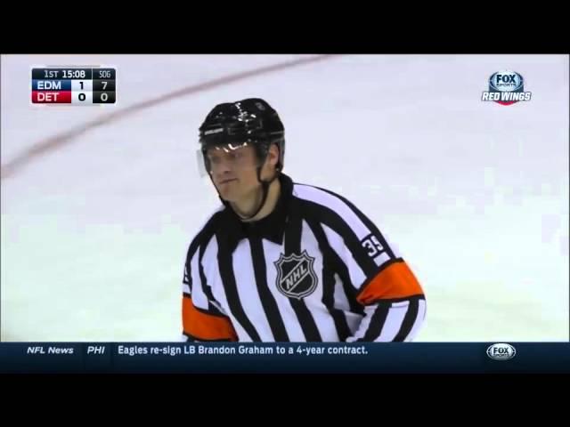 First russian refree in NHL history calls his first penalty!!!