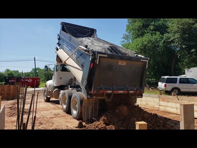 Dump Truck - Dumping a Load of Dirt