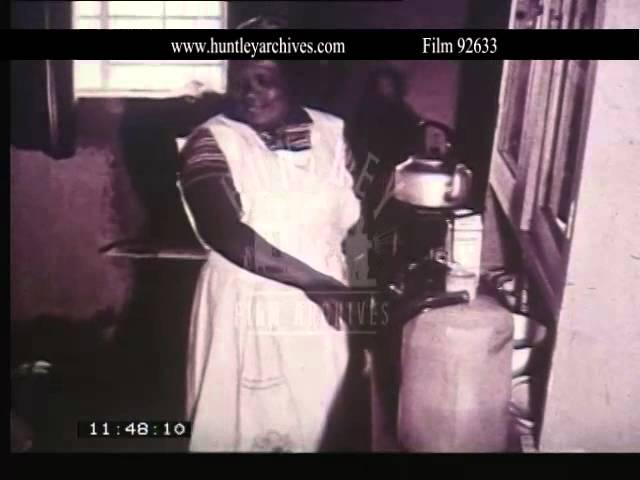 Poor black servant in white South Africa.  Archive film 92633