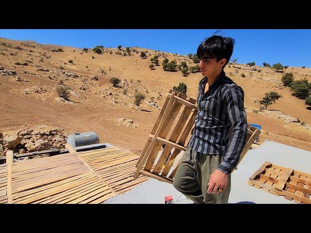 "Joint effort: installing pallets on the roof of a warehouse with the presence of Ali and Abu"