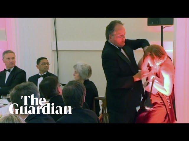 Conservative MP Mark Field grabs climate protester by the neck