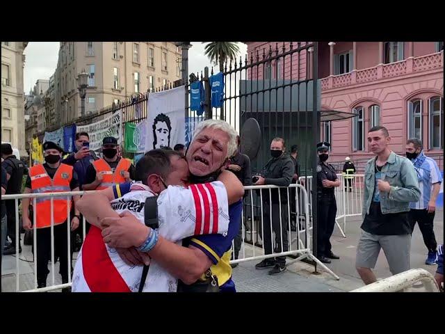 Boca and River fans share tears at Maradona farewell