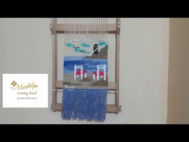 Woven wall hanging landscape tapestry on the frame loom