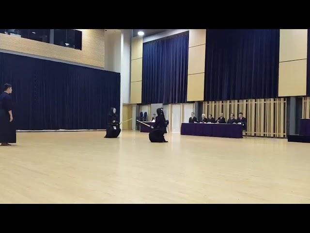 Issac Ru (left) Kendo 5 Dan grading