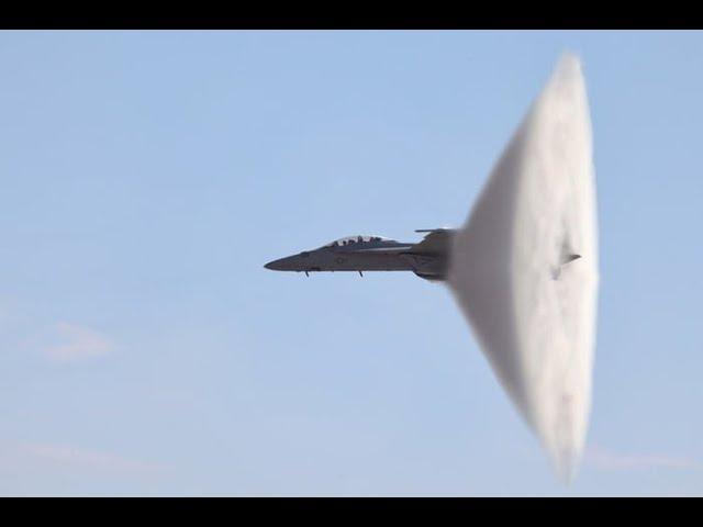 Navy F/A-18 Breaking The Sound Barrier Over Water