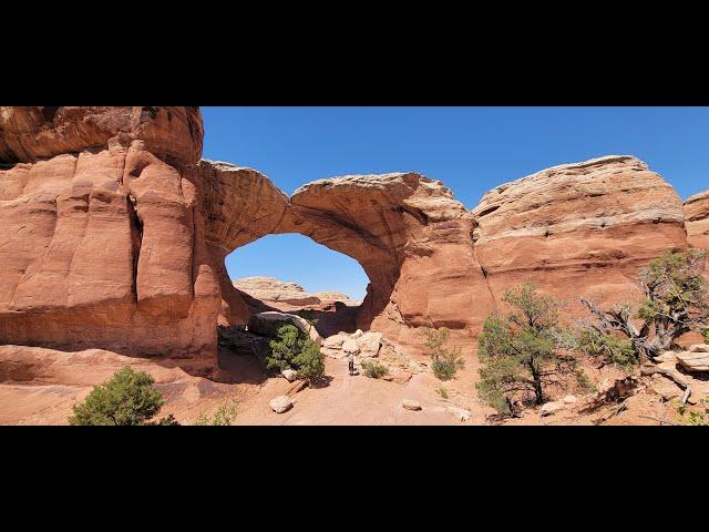 Arches Sand and Broken Arches Hiker Edit