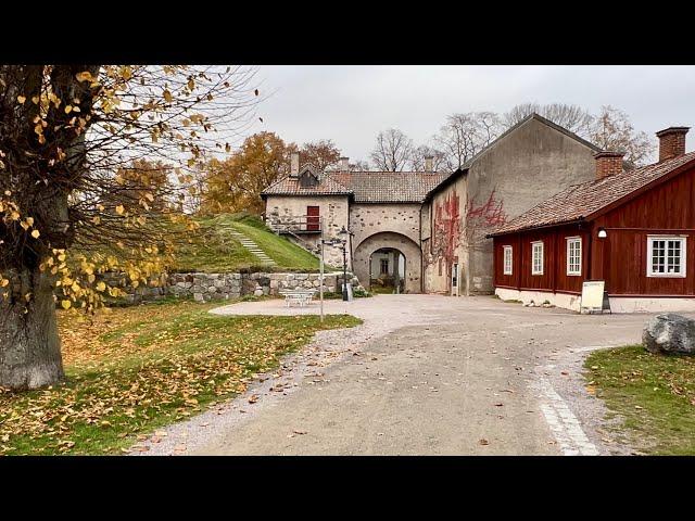 Sweden Walks: Medieval ruin and riverside of Nyköping in autumn colors.