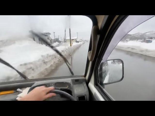 Man in a light truck experiences slip panic while drifting on black ice road [shocking video]