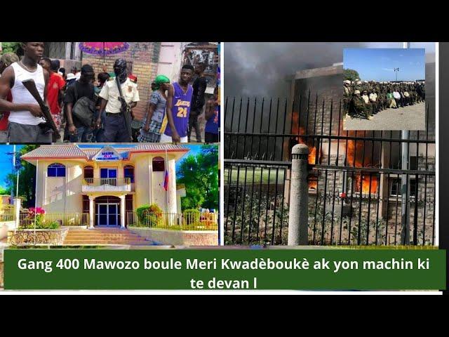 Gang 400 Mawozo boule Meri Kwadèboukè ak yon machin ki te devan li