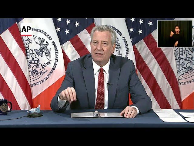 NYC to reopen schools, even as virus cases spike