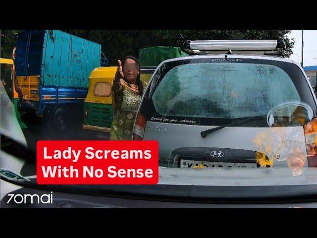 Angry lady screams at car behind for hitting their vehicle