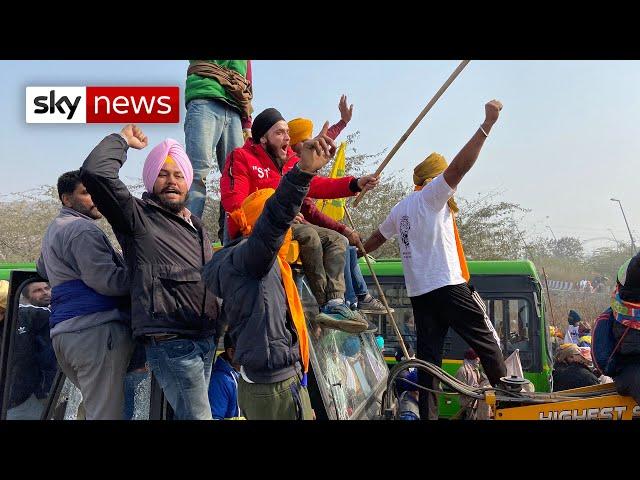 India: Tear gas fired as farmers clash with police in Delhi