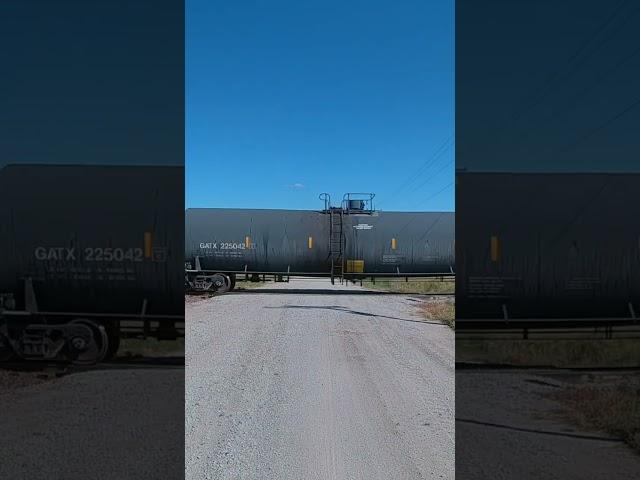 2 UP Locomotives with 40 freight cars traveling at a speed of 43 MPH