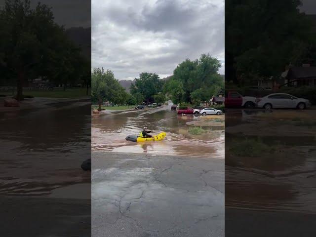 Man Paddles Through Floodwaters as Severe Weather Strikes East Utah