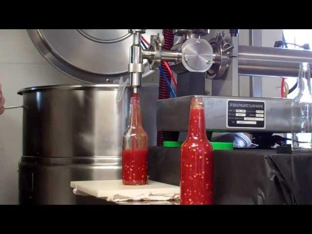 Hot Sauce Being Made And Bottled From The Hot Sauce Masters.