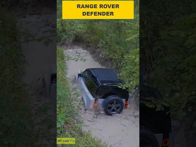 Range Rover Defender offroad in mud terrain