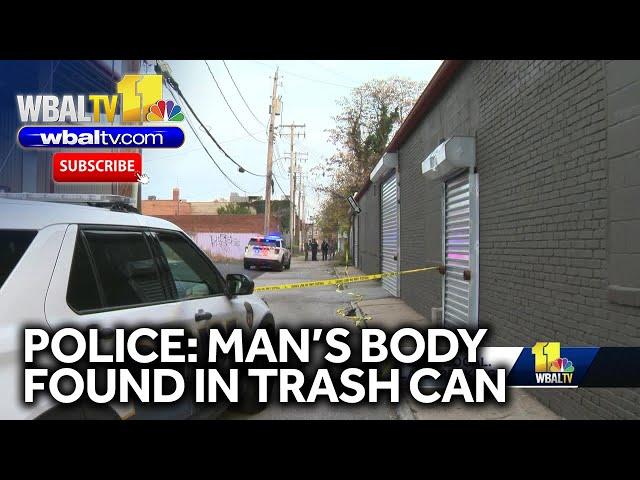 Police: Man's body found in trash can