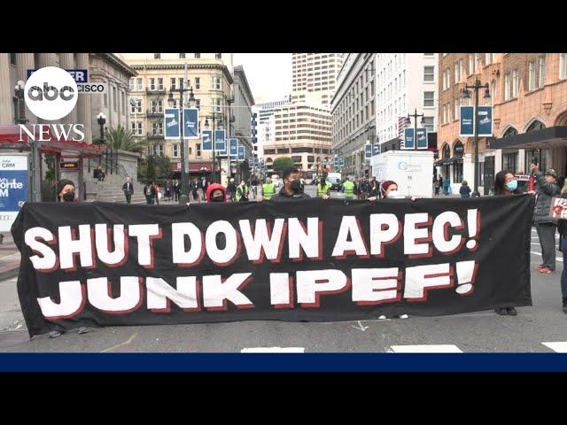 Protesters clash with police outside APEC summit