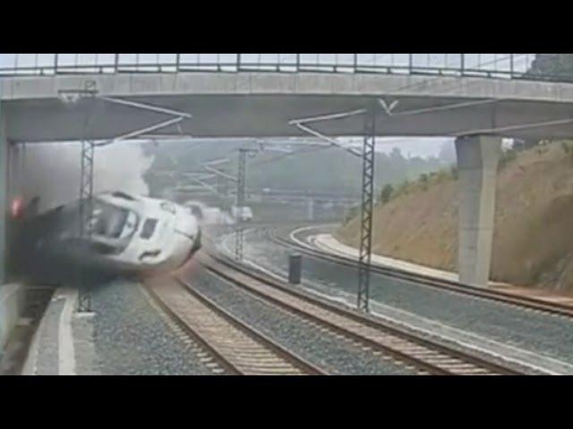 The moment of impact: Terrifying CCTV of Spain train crash near Santiago de Compostela