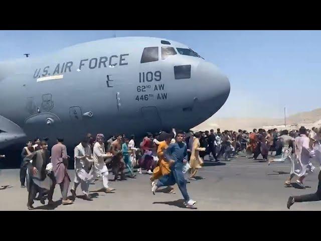 Watch: Afghans Run Alongside U.S. Military Plane At Kabul Airport