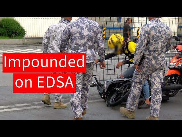 Rider falls in the exclusive EDSA busway