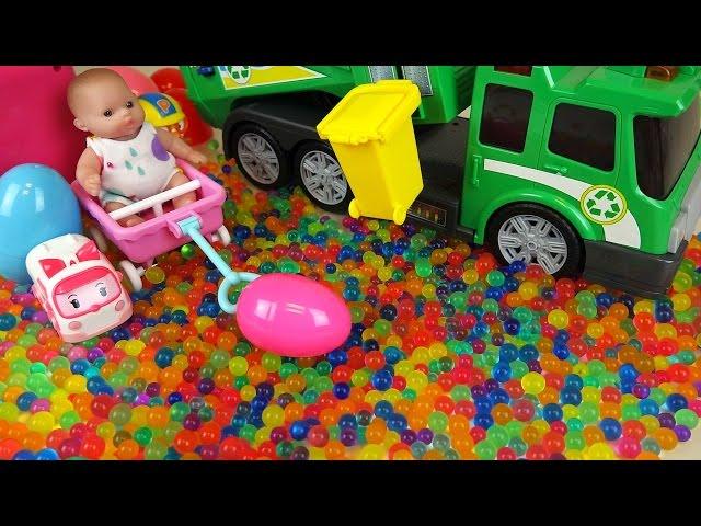 Baby doll and garbage truck Surprise eggs color candy Kinder Joy toys