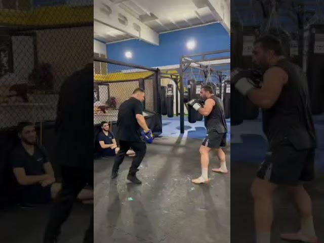 Javier Mendez Holds Pads for Thunder Kicks of Magomed Kurbaitaev