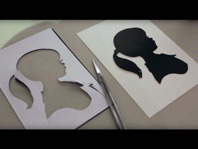 Silhouette artist; a master at paper cuts