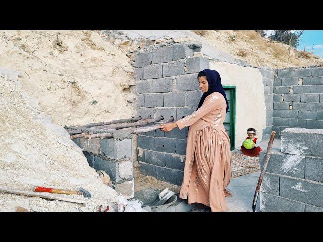 Mother's winter shelter: building firewood storage for heating in the mountains