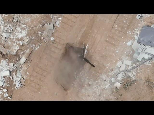 Footage of a terrorist armed with an RPG emerging from a tunnel shaft in eastern Deir al-Balah