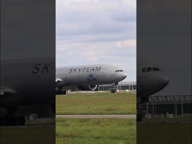 KLM Sky team livery Boeing 777-306 applying brakes after landing into Amsterdam Airport