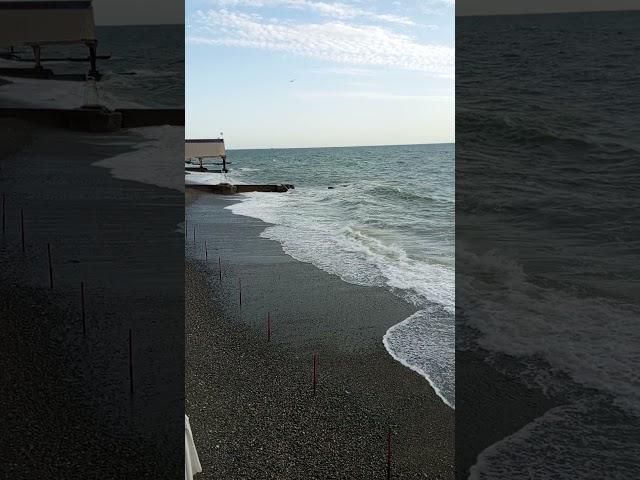 17 Sochi storm embankment, beach people sunbathe