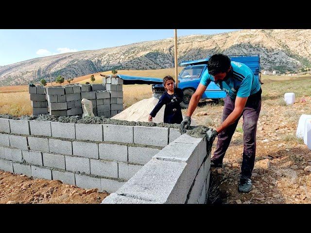 Building Walls, Building Dreams: Atabek and Afsaneh's Collaborative Effort