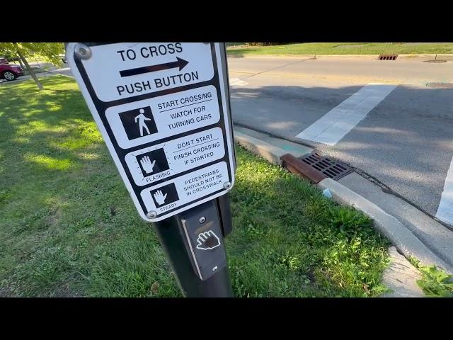 Push or Wave Crosswalk Buttons at - Grace St and St Charles Rd