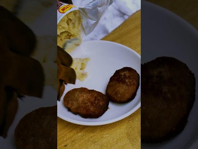 Hot meal on a wood stove during a heavy snowfall